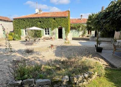 €249950 - Attractive Stone Property With Gite, Swimming Pool And Outbuildings