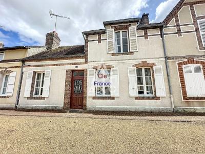 Maison Mitoyenne De Centre Bourg à La Ferte-vidame : Une Opportunite à Saisir